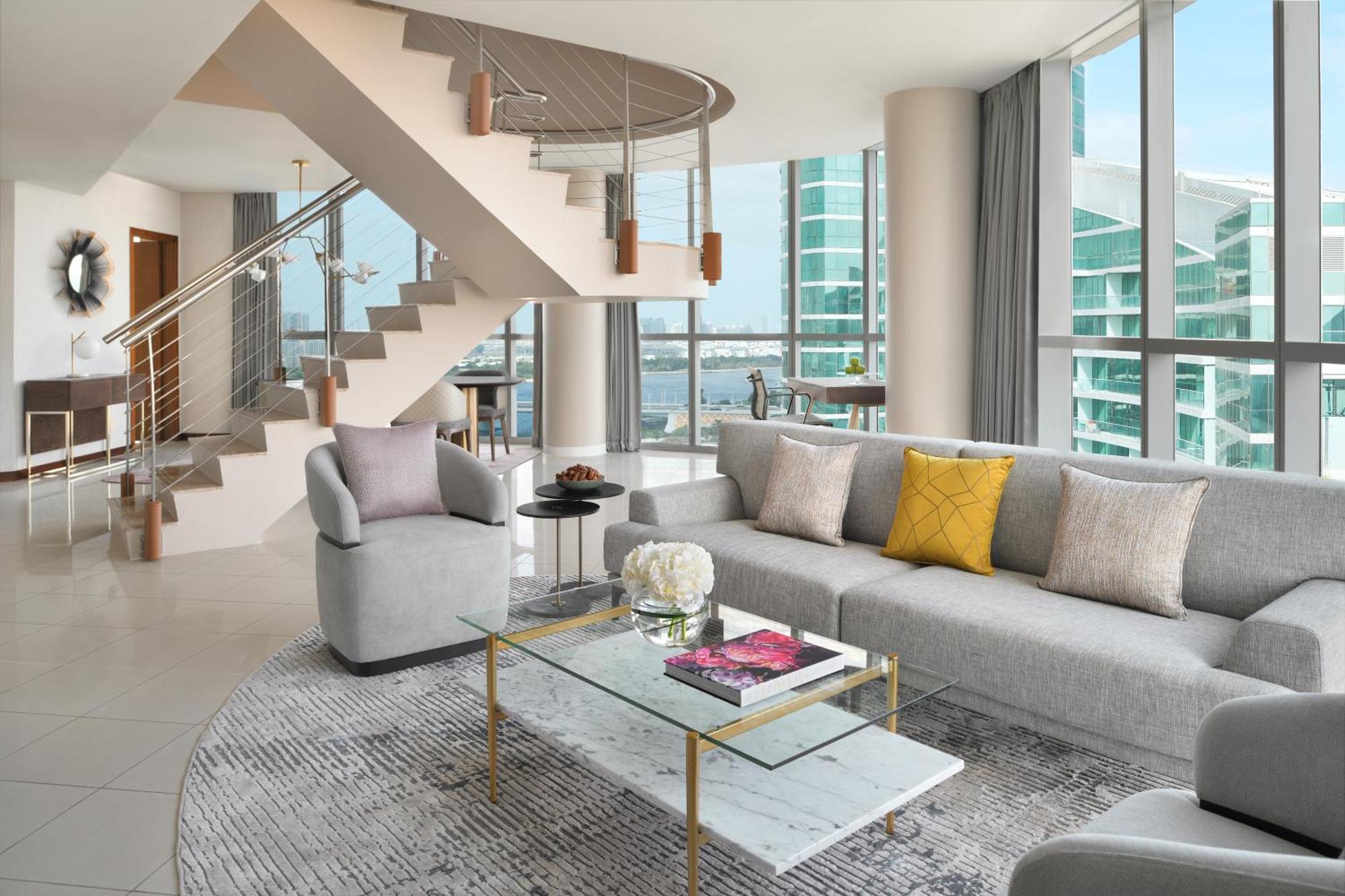 Intercontinental Residence Suites Dubai Festival City By Ihg Exteriér fotografie A living room in a penthouse at The Ritz-Carlton, South Beach